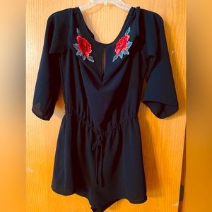 Brand new light weight jumper black, w/red roses, size large